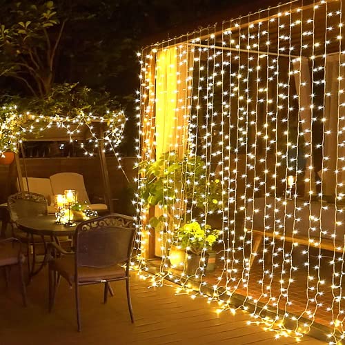 JMEXSUSS Remote Control Curtain Lights Plug in Curtain Lights Outdoor,300 LED Window Wall Hanging Curtain String Light for Bedroom Wedding Party Backdrop Garden Indoor Christmas (Warm White)