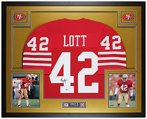 Ronnie Lott Autographed Red San Francisco Jersey – Beautifully Matted and Framed – Hand Signed By Lott and Certified Authentic by Beckett – Includes Certificate of Authenticity