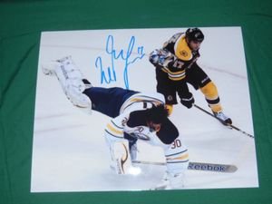 Boston Bruins Milan Lucic Autographed 8×10 Hitting Ryan Miller Photo