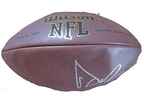Dak Prescott Autographed Wilson NFL Football W/PROOF, Picture of Dak Signing For Us, PSA/DNA Authenticated, Dallas Cowboys, Mississippi State Bulldogs, Pro Bowl, Super Bowl