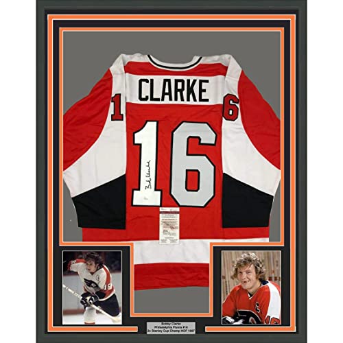 Framed Autographed/Signed Bob Bobby Clarke 33×42 Philadelphia Orange Hockey Jersey JSA COA
