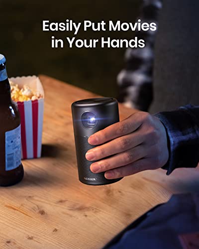 Anker NEBULA Capsule, Smart Wi-Fi Mini Projector, 100 ANSI Lumen Portable Projector, 360° Speaker, Movie Projector, 100 Inch Picture, 4Hr Video Playtime for Inside and Outside, Watch Anywhere | The Storepaperoomates Retail Market - Fast Affordable Shopping