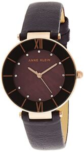 Anne Klein Women’s AK/3272RGPL Premium Crystal Accented Rose Gold-Tone and Dark Plum Leather Strap Watch