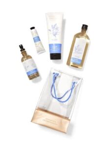 Bath & Body Works LAVENDER VANILLA Gift Bag Set – Body Cream – Body Wash and Foam Bath – Pillow and Body Mist and Hand Cream arranged inside a transparent gift bag, Light Blue